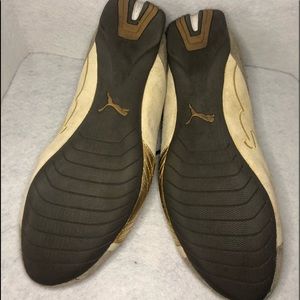 Gold puma sneakers